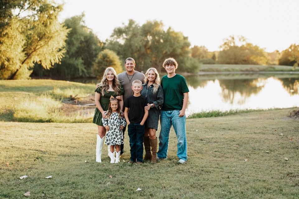 Family of six by the lake
